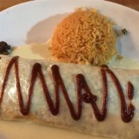 Maria'S Big Burrito · Grilled *steak and chicken, rice, black beans, bell peppers and onions topped with cheese di...