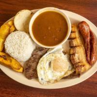 Bandeja Paisa · Typical Colombian platter with rice, beans, pork skin, fried eggs, grilled steak, corn patty...