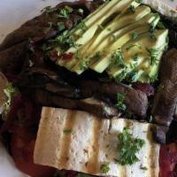 Portabella Tofu · Grilled organic tofu, grilled portabella mushrooms, avocado, tomatoes, and red cabbage on a ...