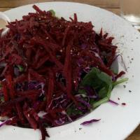 Beet Salad · Organic mixed greens, fresh beets, carrots, red cabbage, raisins, extra virgin olive oil, an...