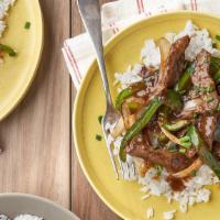 Pepper Steak With Onion · Served with rice.