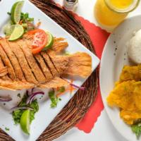 Mojarra Criolla · Whole imported tilapia deep fried, served with rice, salad, and our delicious green plantains.