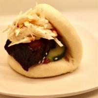 Pork Buns (3) · Choice of savory pork belly with soy garlic sauce or crispy strips, topped with coleslaw, sp...
