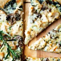 Florentine Pizza · Alfredo sauce, spinach and chicken.