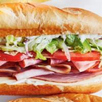 House Special · Prosciutto, ham, turkey, salami, cheese, lettuce, tomato, red onion and mayonnaise.