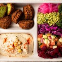 Hummus Bowl · 5 falafel balls and a side of hummus with your choice of salad bar toppings.