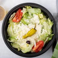 Greek Salad · Crisp iceberg lettuce, tomato, onion, pepperoncinis, kalamata olives, feta, and Athens dress...
