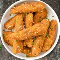Spicy Teriyaki Tenders · Chicken tenders breaded and fried until golden brown before being tossed in spicy teriyaki s...