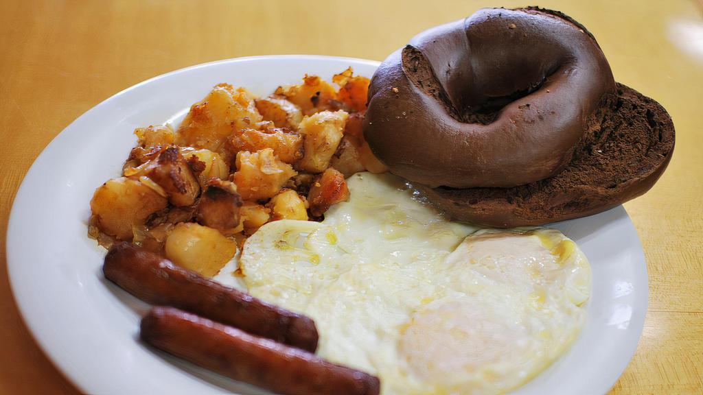 Eggs (2) Any Style · Includes your choice of buttered bagel, bialy or toast and your choice of home fries, hash browns, grits, oatmeal or tomatoes.