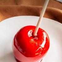 Candy Apple · Granny smith apple. Dip in vanilla flavored hard candy coating.