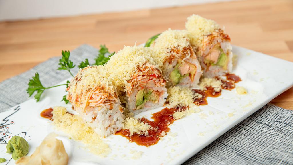 Andy'S Roll · Salmon tempura, avocado and spicy crab topped with crunchy and eel sauce.
