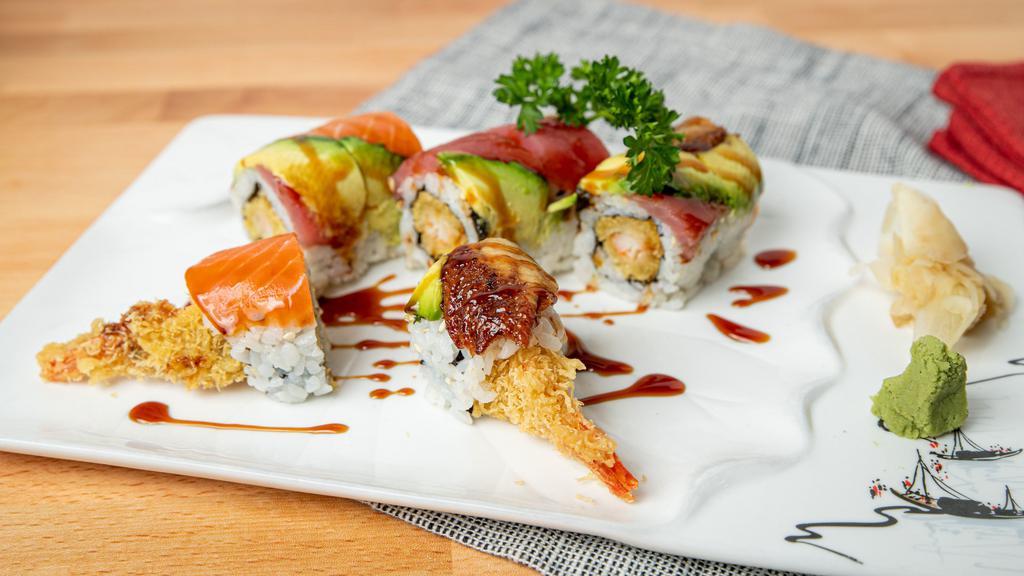 Angel Roll · Shrimp tempura and fish eggs topped with tuna, salmon, yellowtail andeel.
