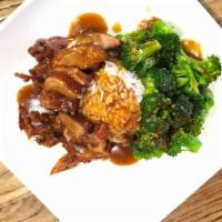 Thai Spice Roasted Duck · Sliced roasted Duck meat, steam broccoli Topped with Garlic brown sauce and side of steam rice