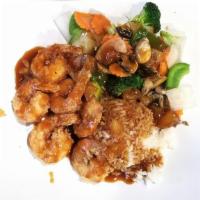 Thai Spice Pineapple Shrimp · Lightly breaded fried Large Shrimp Atop of mix vegetable with pineapple sauce and side of st...