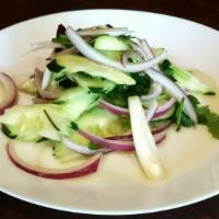Cucumber Salad · Thin sliced Cucumber, purple onion seasoning with special lime sauce.