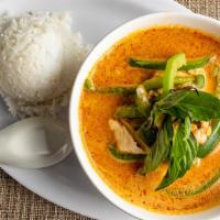 Red Curry · Medium Spice. Popular spicy curry in Thailand, slice bamboo, carrot, bell pepper and basil.