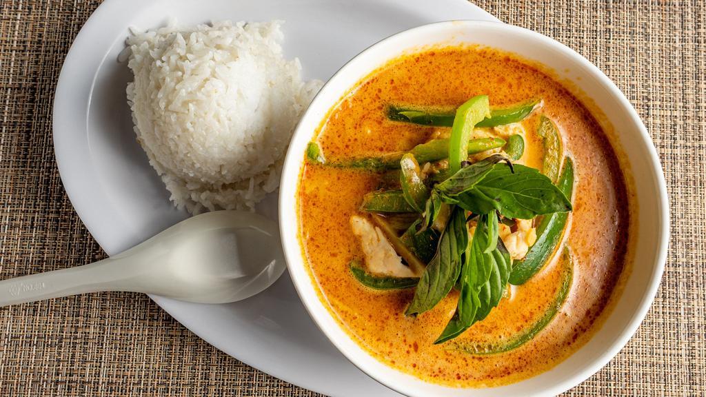Red Curry · Medium Spice. Popular spicy curry in Thailand, slice bamboo, carrot, bell pepper and basil.