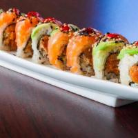 Pink Lady Roll · 8 pieces per order. Spicy tuna and tempura flake topped with salmon, avocado, ponzu, and hot...