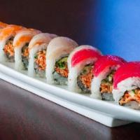 Rainbow Roll · 8 pieces per order. Crab salad, cucumber, avocado, topped with tuna, salmon, and Y.T.