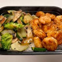Shrimp Cajun Plate · Shrimp with mixed vegetables (zucchini, broccoli, and mushroom) and sauce (cajun or yum yum)