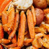 Snow Crab Legs And Shrimp No Head · (1 cluster) Snow Crab Legs + (0.5 lb) Shrimp No Head
(Every bag includes corn and potato)
