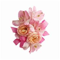 Beloved Blooms Corsage · So pretty in pink roses with delicate pink alstroemeria.   Light pink spray roses and alstro...