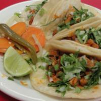 1) Tacos (4) · 4 Tacos with choice of meat, cilantro and onions.
