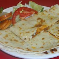 2) Quesadilla · A 12 Inch flour tortilla folded in half then cut into 3 pieces. Comes with melted mozzarella...