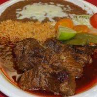 9) Orden De Birria · Beef stew with rice, beans, lettuce and tomato on the side and your choice of flour or corn ...