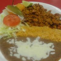10) Combinacion · Your choice of meat with rice, beans, lettuce and tomato on the side and your choice of flou...