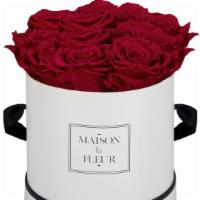 Flawless Classics Round Box With Premium Preserved Roses · Classic roses in a round box. Roses available in the following colors: white, silver gold pi...