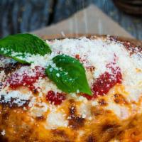 Meat Lasagna · Pasta sheet with ground beef, ricotta cheese, mozzarella, bechamel cream and grana padano ch...