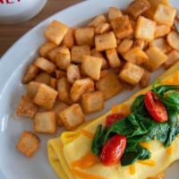 Create-Your-Own Omelet · Build your own hearty 3-egg omelet by choosing one cheese and three additional toppings. Ser...