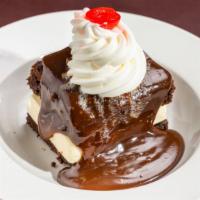 Shoney'S World Famous Hot Fudge Cake · Vanilla ice cream between freshly baked layers of Shoney's famous chocolate cake covered in ...