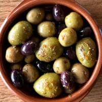 Marinated Olives · Marinated olives with thyme, orange peel and garlic