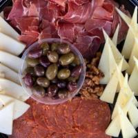 Chef'S Meat & Cheese Board - Add On · Tetilla Cheese, Manchego Cheese, Serrano Ham, Chorizo, candied walnuts, marinated olives