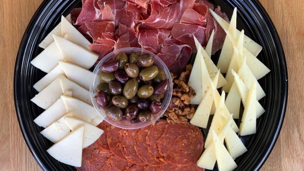 Chef'S Meat & Cheese Board - Add On · Tetilla Cheese, Manchego Cheese, Serrano Ham, Chorizo, candied walnuts, marinated olives