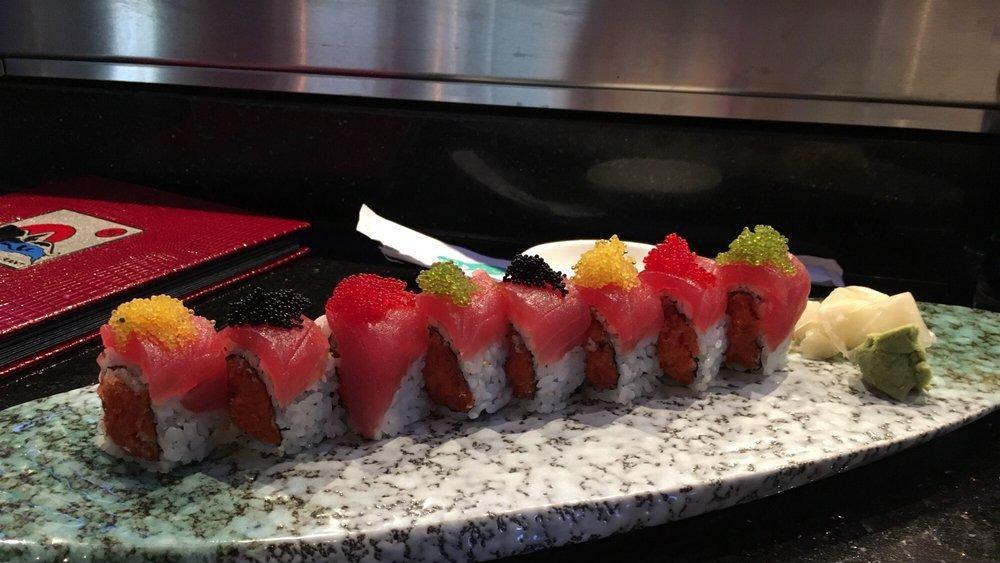 Sushi A · Seven pcs nigiri sushi with one California roll.