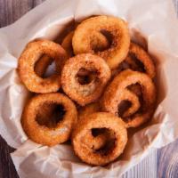 Onion Rings · Thick cut, battered and golden fried onion rings.