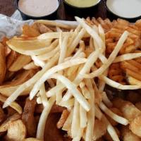 Frycuterie · 8.99/2455 Cal. Shoestrings, big fat fries, coated waffle fries, curly fries, and tots for sh...