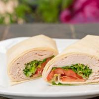 Turkey Sub · Fresh breast of turkey sliced, with provolone cheese, lettuce, tomato, onion, mayo, and oil ...