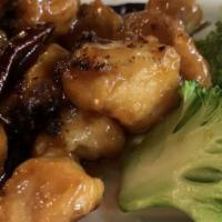 General Tso'S Chicken · Hot & spicy. Chunks of chicken breast with our Chef’s special spicy brown sauce with broccoli