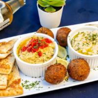 Aqua  Sampler (Falafel, Tabbouleh, Hummus, & Baba Ganoush) · Four Falafel balls with Tahini, Tabbouleh, Hummus, Babaghonoush and Pita