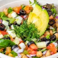 Mediterranean Salad · Organic greens, chickpeas, green pepper, red onion, tomato, olives, and cucumber, topped wit...
