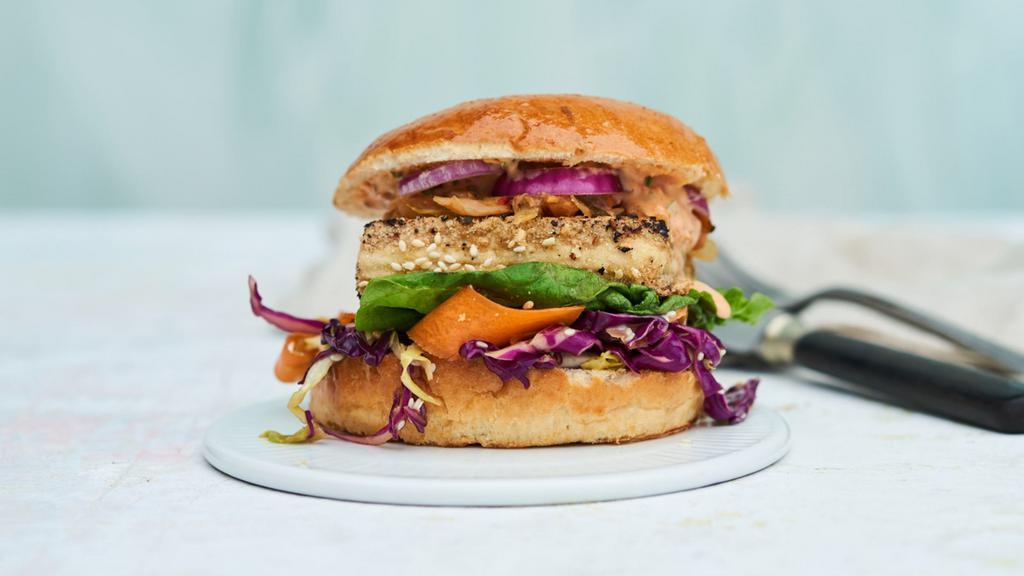 Burger Sriracha Crunch · Topped with Monterey Jack cheese, lettuce, Sriracha tossed lattice chips and a spicy Sriracha mayo