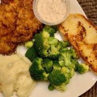 Country Fried Chicken · Deep fried southern style chicken breast, topped with white peppered gravy, served with two ...