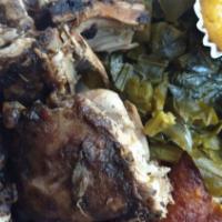 Jerk Chicken · Comes with rice and peas cabbages and plantains.