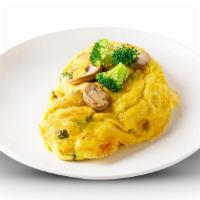 Veggie Omelette · Green and red peppers, onions sauteed with fresh broccoli and mushrooms. Served with Pancake...