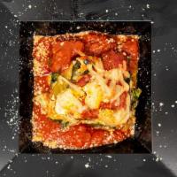 Hearty Vegan Lasagne · A comforting feast of eggplant and other vegetables, marinara sauce, herbs, vegan cheeses