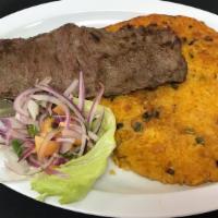 Tacu-Tacu Con Carne · A crispy combination of white beans and rice accompanied by grilled steak Meat Temperature C...